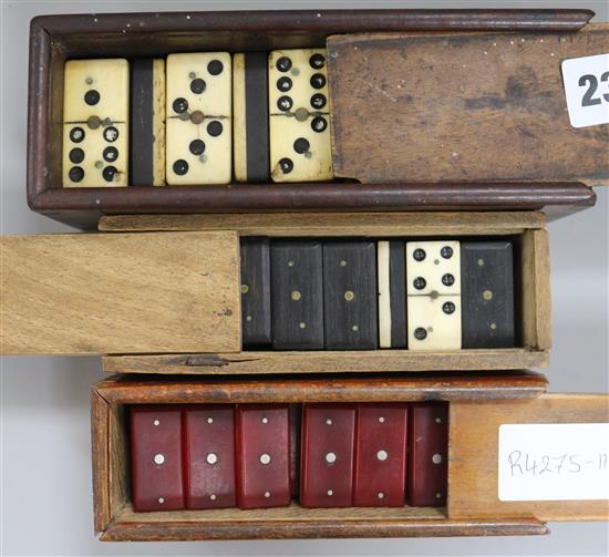 Three sets of dominoes